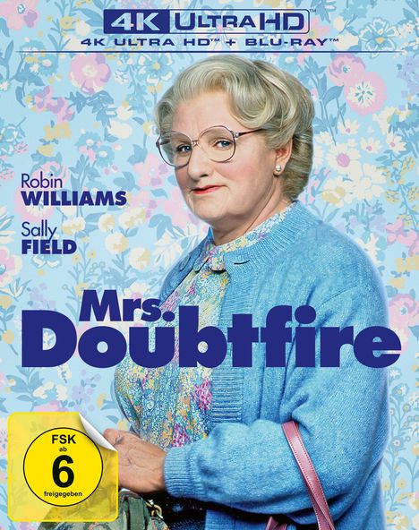 „4K ULTRA HD“, „Robin Williams“, „Sally Field“, „Mrs. Doubtfire“, „FSK ab 6“. Eine Person in blauer Strickjacke.