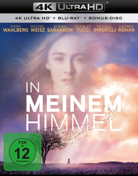 „IN MEINEM HIMMEL“, mehrere Schauspielernamen, ab 12 freigegeben. Oben Gesicht, unten Landschaft mit Baum und Person.