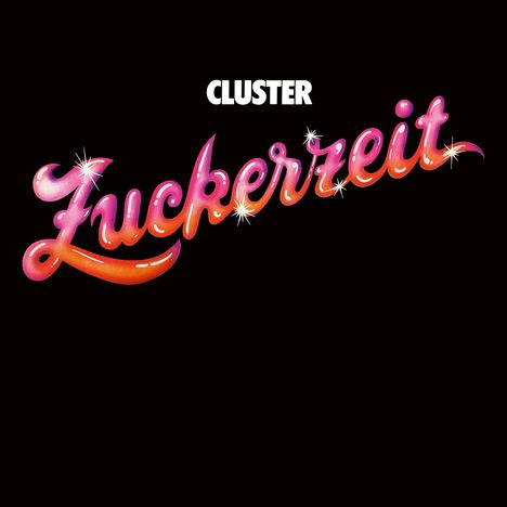 Text: "CLUSTER" oben, "Zuckerzeit" in großen, glitzernden, pink-orange Schriftzügen darunter auf schwarzem Hintergrund.