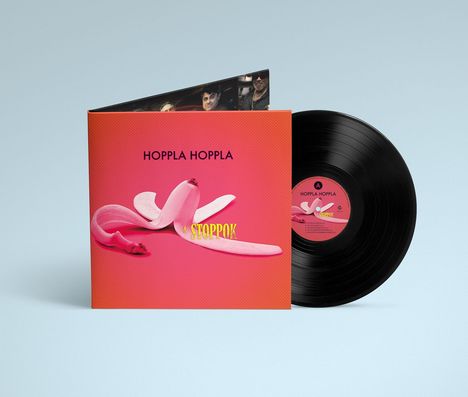 „HOPPLA HOPPLA“ und „STOPPOK“ auf einem Cover mit rosa Bananenschalen, daneben eine schwarze Schallplatte.