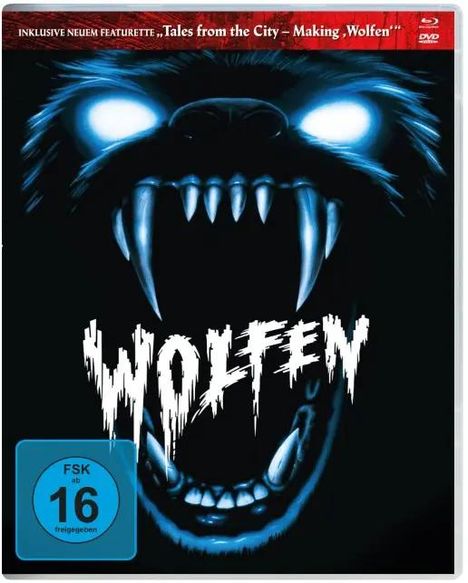 "WOLFEN" in zackiger Schrift. Davor das furchteinflößende Gesicht eines Wolfes mit leuchtenden Augen und gefletschten Zähnen. FSK 16.