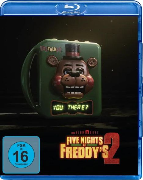 Text: "YOU THERE?", "FIVE NIGHTS AT FREDDY'S 2", "FSK 16".  
Ein Animatronik-Bär mit beleuchtetem Text auf einem Gerät.