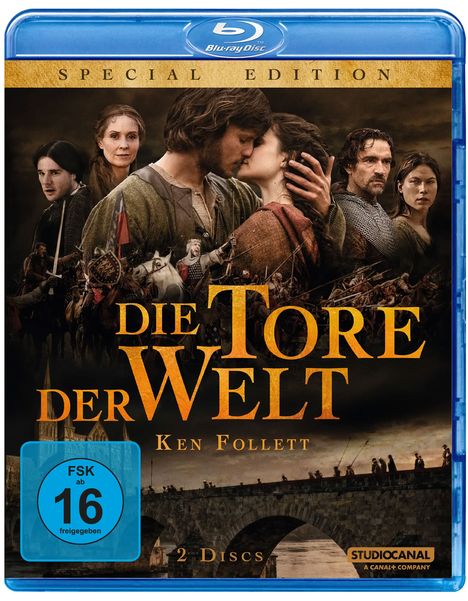 "Die Tore der Welt – Ken Follett." Mehrere Personen in mittelalterlicher Kleidung mit dramatischer Kulisse. FSK 16.