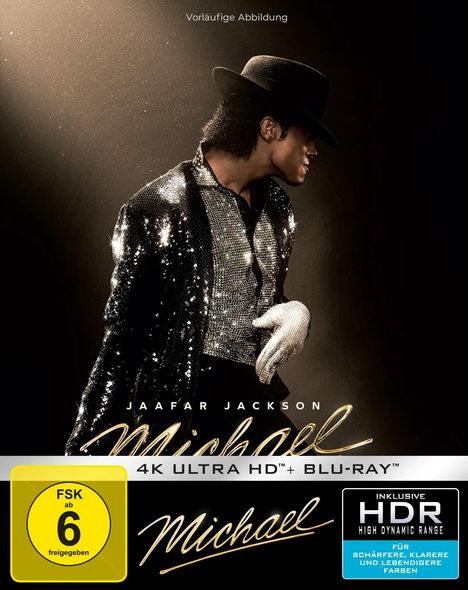 "Vorläufige Abbildung", "Jaafar Jackson", "Michael", "4K ULTRA HD + BLU-RAY", "FSK ab 6 freigegeben". Eine stilvolle Figur mit Hut, Glitzerjacke und Handschuh.
