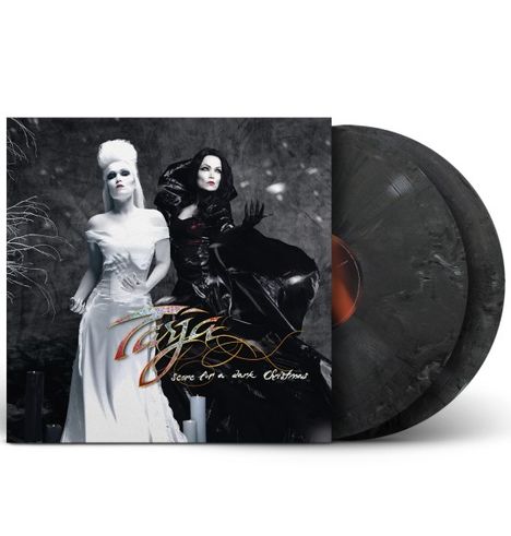 „Tarja – score for a dark Christmas“

Zwei Frauen in kontrastierenden schwarzen und weißen Kleidern, Kerzen im Vordergrund.