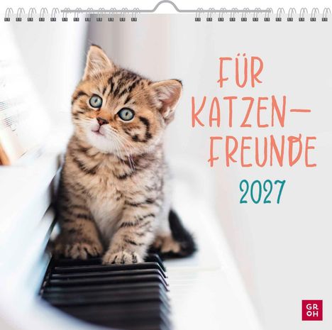 Text: "FÜR KATZENFREUNDE 2027". Ein süßes Kätzchen sitzt auf einer Klaviertastatur. Oben eine Spiralbindung.