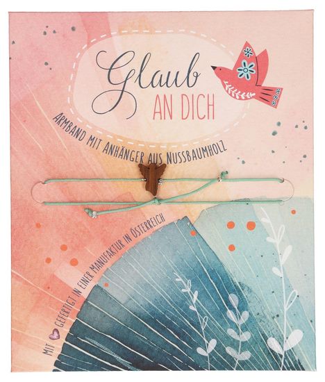 "Glaub an dich" steht in eleganter Schrift. Illustration eines roten Vogels, darunter ein Armband mit Holzanhänger.