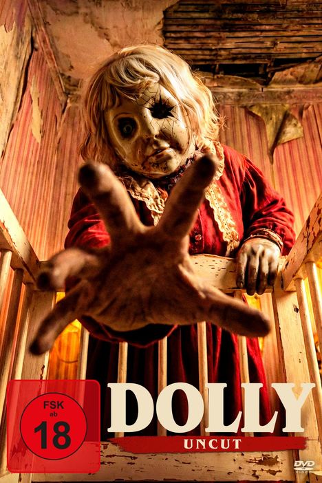 Text: "MAMA WEISS ES AM BESTEN", "DOLLY", "BALD IM KINO". Eine gruselige Puppe in einem spärlich beleuchteten Raum.