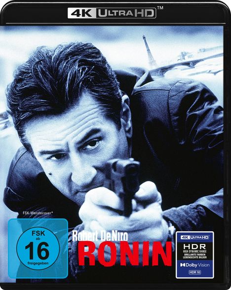 "Robert De Niro RONIN" in roten Buchstaben. Ein Mann zielt mit einer Pistole, im Hintergrund der Eiffelturm.