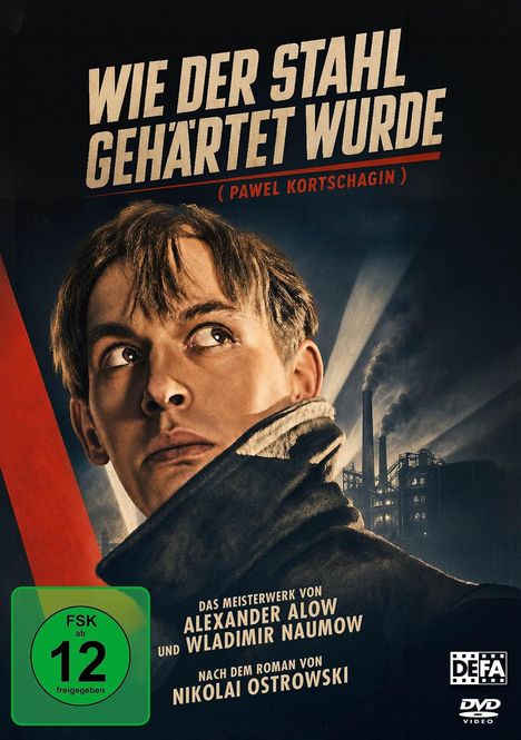 "Wie der Stahl gehärtet wurde" in großen Buchstaben. Ein Mann schaut ernsthaft nach oben, mit einer Fabrik im Hintergrund.