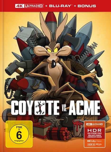 Text: "COYOTE vs. ACME", "FSK ab 6 freigegeben". 
Illustration: Ein Koyote umgeben von Raketen und Werkzeugen.