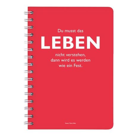 Notizbuch mit Spiralbindung und rotem Umschlag. Text: "Du musst das LEBEN nicht verstehen, dann wird es werden wie ein Fest."