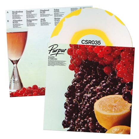 Text: "Purpur", "ZAHN", "CSR035". Eine bunte Vinylplatte, rote und schwarze Johannisbeeren, eine halbe Zitrone.