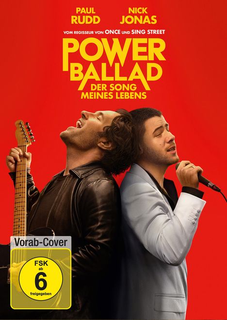 Texte: „MEISTERWERK“, „PAUL RUDD“, „NICK JONAS“, „POWER BALLAD“. Zwei Männer mit Gitarre und Mikrofon auf rotem Hintergrund.