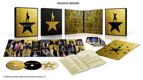 "VORLÄUFIGE ABBILDUNG" oben in Schwarz. Mehrere CDs, Fotos, ein Buch und eine Box mit "HAMILTON"-Logo und Sternmotiv.