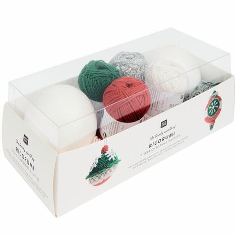 Auf der Verpackung steht "RICORUMI". Sie enthält bunte Garnknäuel in einer klaren Box.