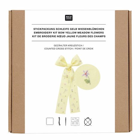 Stickpackung mit gelber Schleife und Wiesenblümchen, gezählter Kreuzstich, Abbildung zeigt gestickte Blume.