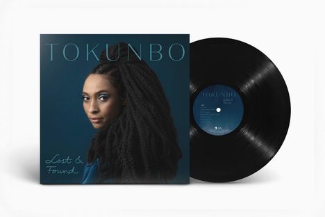 Albumcover mit "TOKUNBO" und "Lost & Found". Eine Frau mit langen Haaren blickt zur Seite. Schallplatte daneben.