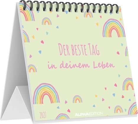 "Der beste Tag in deinem Leben" steht in pinker Schrift auf einem Tischkalender, umgeben von bunten Regenbögen.