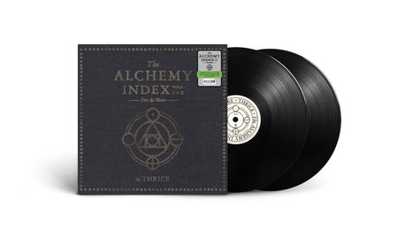 Text: "The Alchemy Index Vols. I & II Fire & Water by Thrice." Zwei schwarze Schallplatten mit Hülle.