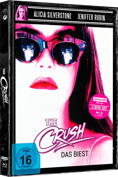 Oben: "Alicia Silverstone, Jeniffer Rubin". Titel: "The Crush – Das Biest". Blaue FSK-16-Plakette. Gesicht mit Sonnenbrille.