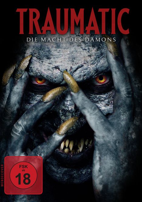 "TRAUMATIC", "DIE MACHT DES DÄMONS", FSK ab 18. Illustration eines bedrohlich dreinblickenden Dämons mit gelben Augen und Krallen.