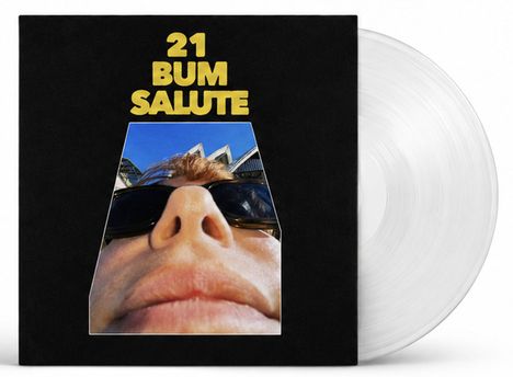Text: „21 BUM SALUTE“. Darunter ein Nahaufnahme-Foto von einem Gesicht mit Sonnenbrille. Dahinter blauer Himmel.