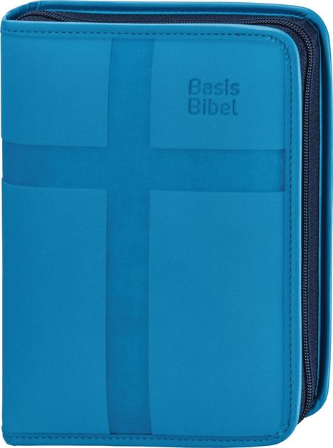 "Basis Bibel" Text auf blauem Einband mit eingeprägtem Kreuz und Reißverschluss an der Seite.