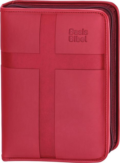 „Basis Bibel“ steht auf einem roten Einband mit einem großen, eingeprägten Kreuz und Reißverschluss.