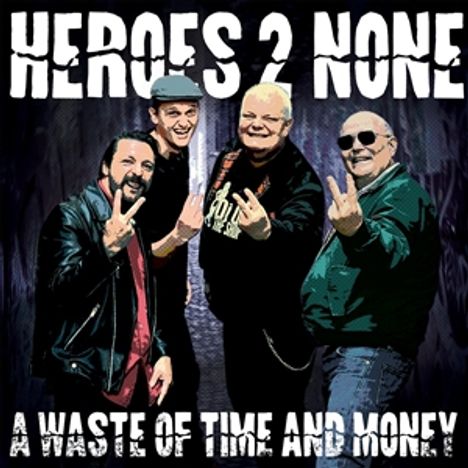 Text: "HEROES 2 NONE", "A WASTE OF TIME AND MONEY". Illustration: Vier Männer posieren mit lächelnden Gesichtern.