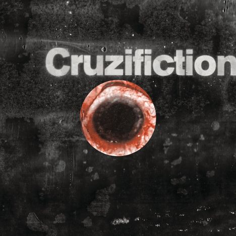 Der Text "Cruzifiction" ist in großen weißen Buchstaben auf schwarzem Hintergrund. Darunter ein roter, augenähnlicher Kreis.
