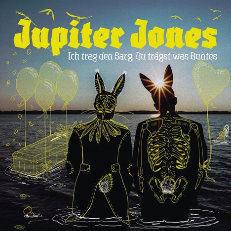 „Jupiter Jones. Ich trag den Sarg, Du trägst was Buntes.“ Zwei Figuren mit Hasenohren vor Wasser, Ballons, Sargskizze.