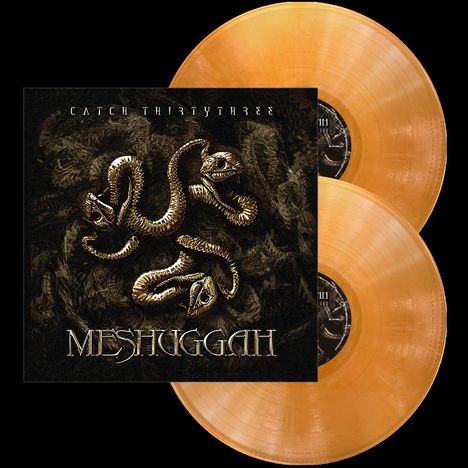 Text: "CATCH THIRTYTHREE, MESHUGGAH". Cover mit schlangenartigem Motiv, zwei orangefarbene Schallplatten sichtbar.