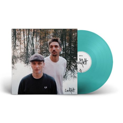Zwei unscharfe Personen vor Wald. Text: "Liedfett" auf Cover und Schallplatte. Türkisfarbene Vinyl-Platte.
