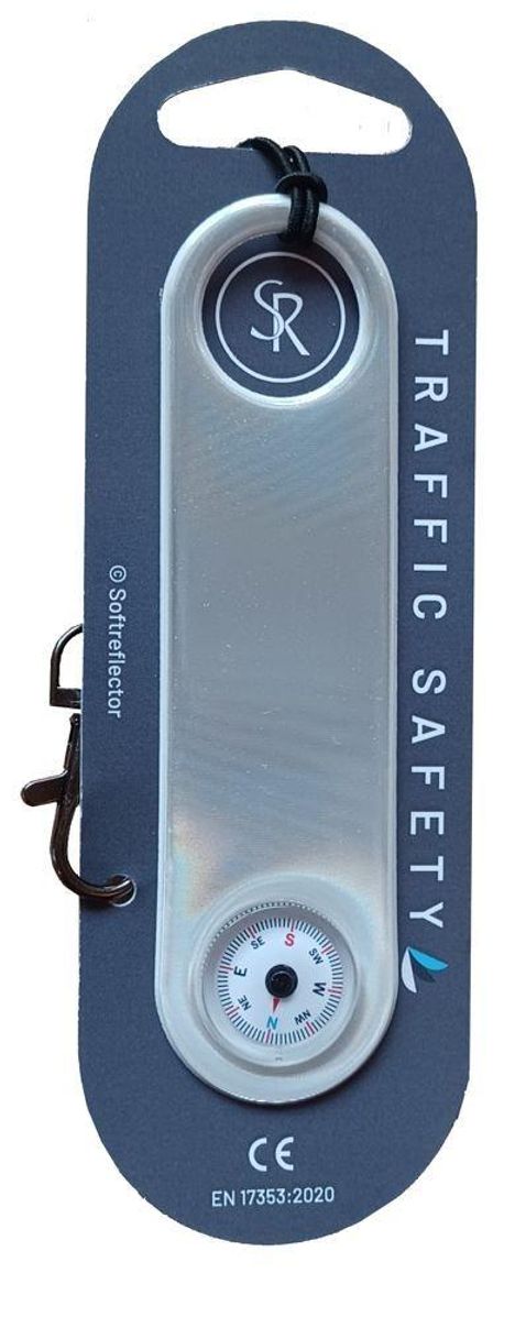"TRAFFIC SAFETY" auf grauem Hintergrund, reflektierendes Band, oberes rundes Symbol mit "SR", unten Kompassanzeige.