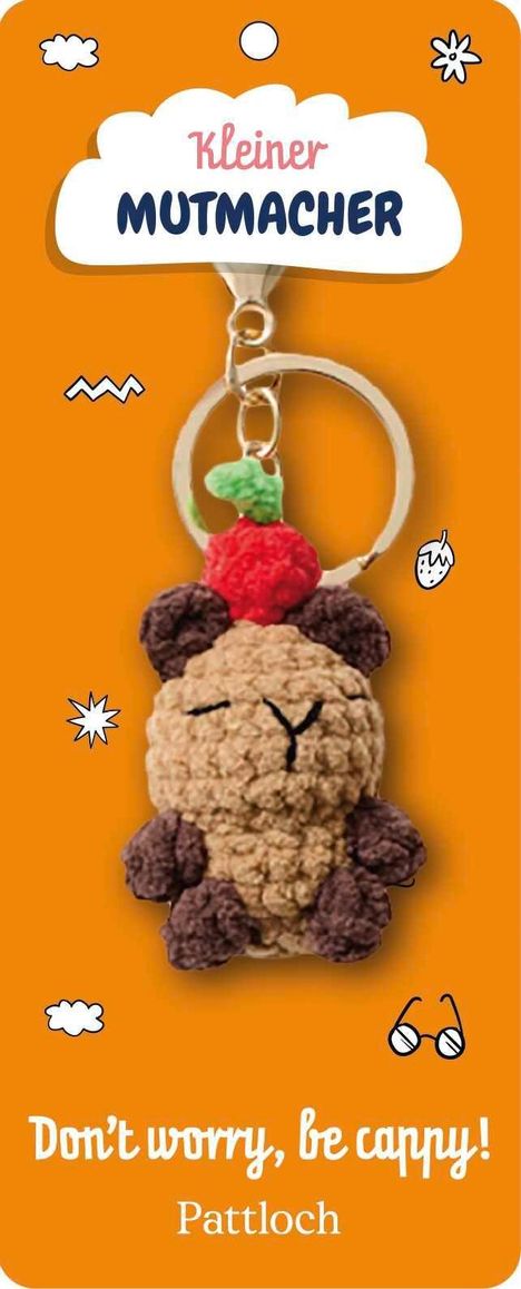 "Kleiner Mutmacher" und "Don't worry, be cappy!" Auf orangem Hintergrund ein süßer Schlüsselanhänger.