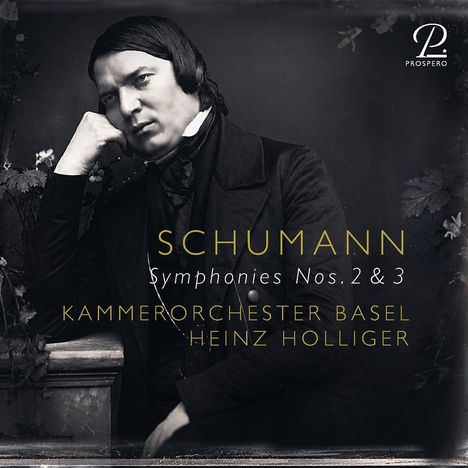 "Schumann Symphonies Nos. 2 & 3 Kammerorchester Basel Heinz Holliger." Schwarz-weißes Porträt eines Mannes im Anzug.