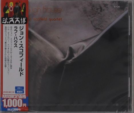 Das Cover zeigt den Text "rough house" und "john scofield quartet". Daneben sind japanische Schriftzeichen sichtbar.