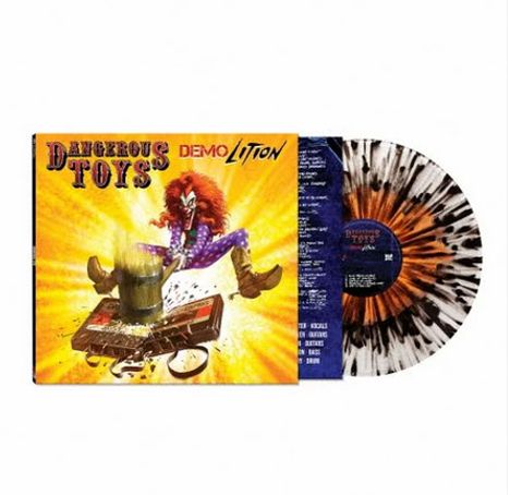 "Dangerous Toys" und "Demo Lition" sind prominent. Ein buntes Cover zeigt einen Clown, der eine Gitarre zerschlägt, daneben eine gesprenkelte Vinyl-Schallplatte.