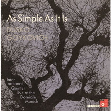 "As Simple As It Is" von Dusko Goykovich, International Quintet, live at the Domicile, Munich. Baumzweige im Hintergrund.