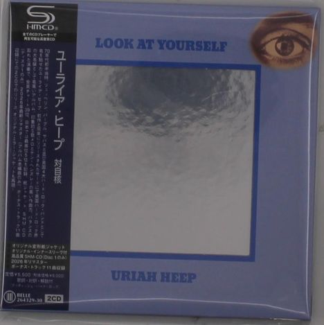"Look at Yourself" und "Uriah Heep" auf blauem Rahmen. Spiegelnde Fläche, oben rechts ein Auge, linker Rand mit japanischem Text.