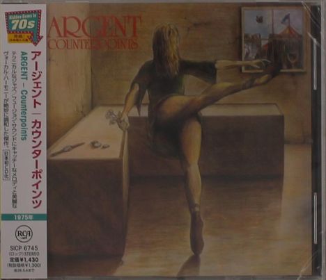 "Argent Counterpoints" und japanische Schriftzeichen sind sichtbar. Eine Ballerina tanzt in einem Raum mit einem Bild an der Wand.