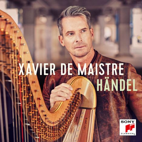„Xavier de Maistre, Händel“; ein Mann mit silbernem Haar spielt eine Harfe, trägt eine braune Lederjacke.