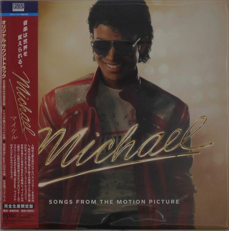 "Michael", "Songs from the Motion Picture". Person in roter Jacke und Sonnenbrille, mit lockigem Haar, lächelt.
