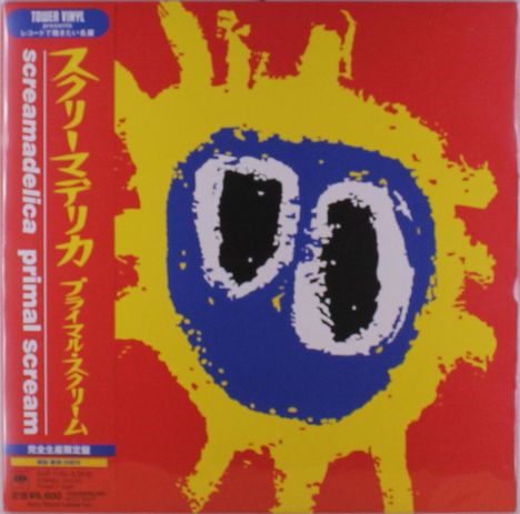 Text: "screamadelica primal scream". Illustration: Gelber, sonnenähnlicher Umriss auf rotem Hintergrund mit blauer Mitte und schwarzen Augen.