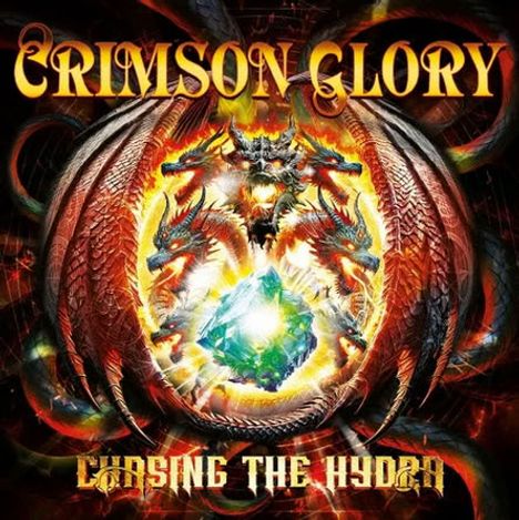 "Crimson Glory" und "Chasing the Hydra" in feurigem Design. Illustration mit Drachen und leuchtendem Edelstein im Zentrum.