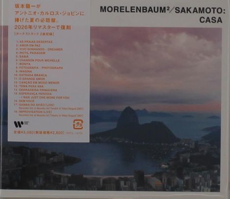 MORELENBAUM² / SAKAMOTO: CASA. Eine Liste von Liedtiteln in Orange. Ein Foto zeigt eine Küstenszene bei Sonnenuntergang.