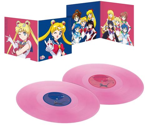 Zwei pinke Schallplatten und ein aufklappbares Cover zeigen bunte Anime-Figuren in Schuluniformen.