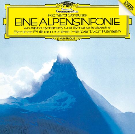 „EINE ALPENSINFONIE“ von Richard Strauss, Berliner Philharmoniker, Herbert von Karajan. Ein Berggipfel vor blauem Himmel.