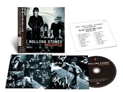 "ROLLING STONES STRIPPED" ist groß geschrieben. Diverse Fotos und eine CD mit Bandbildern, darunter ein Gruppenfoto.